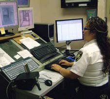 TLG Private Female Security Guard in Security Control Center